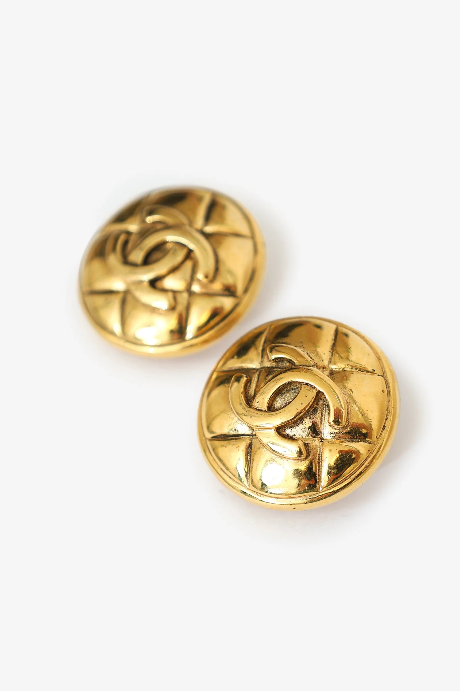 Pre-Loved Chanel™ Gold-tone Quilted Coco Mark Matelassé Round Clip-on Earrings - Image 2